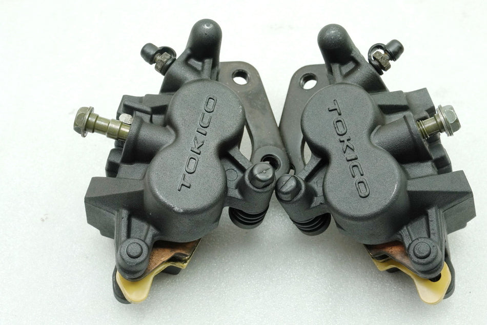 KAWASAKI Z 750 ZR750J Pinza de freno delantera Tokico izquierda derecha Pistones