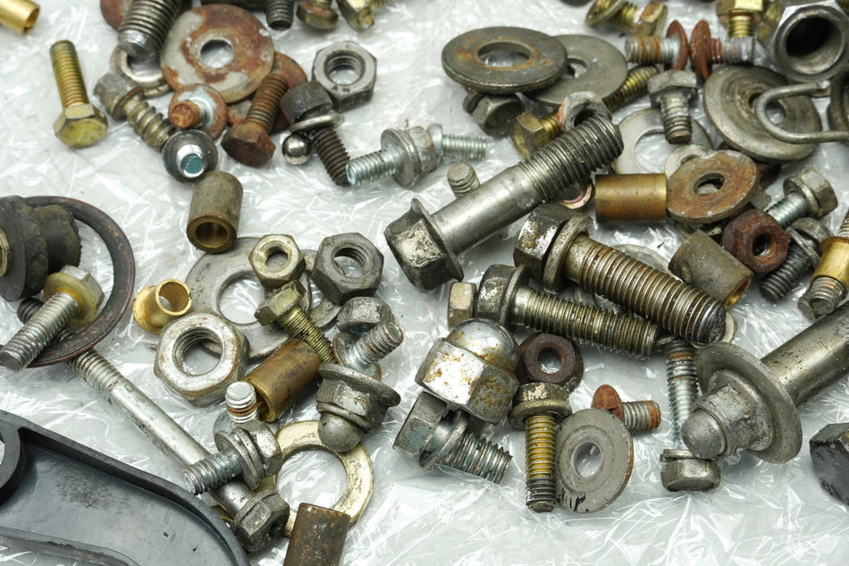 SUZUKI RG 125 NF12B GAMMA Screws Small Parts Nuts Brackets (for frame)