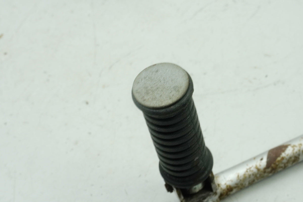 SUZUKI RG 125 NF12B GAMMA Footrest Pillion left Holder Footrest System