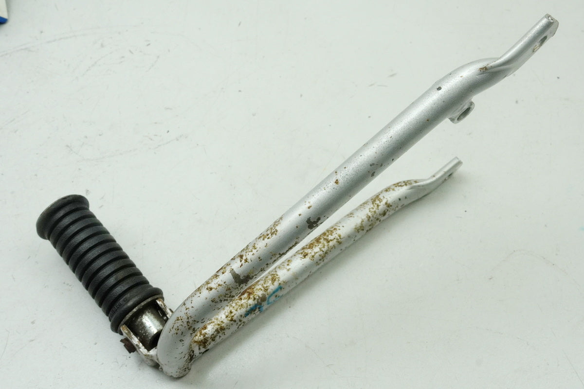 SUZUKI RG 125 NF12B GAMMA Footrest Pillion left Holder Footrest System