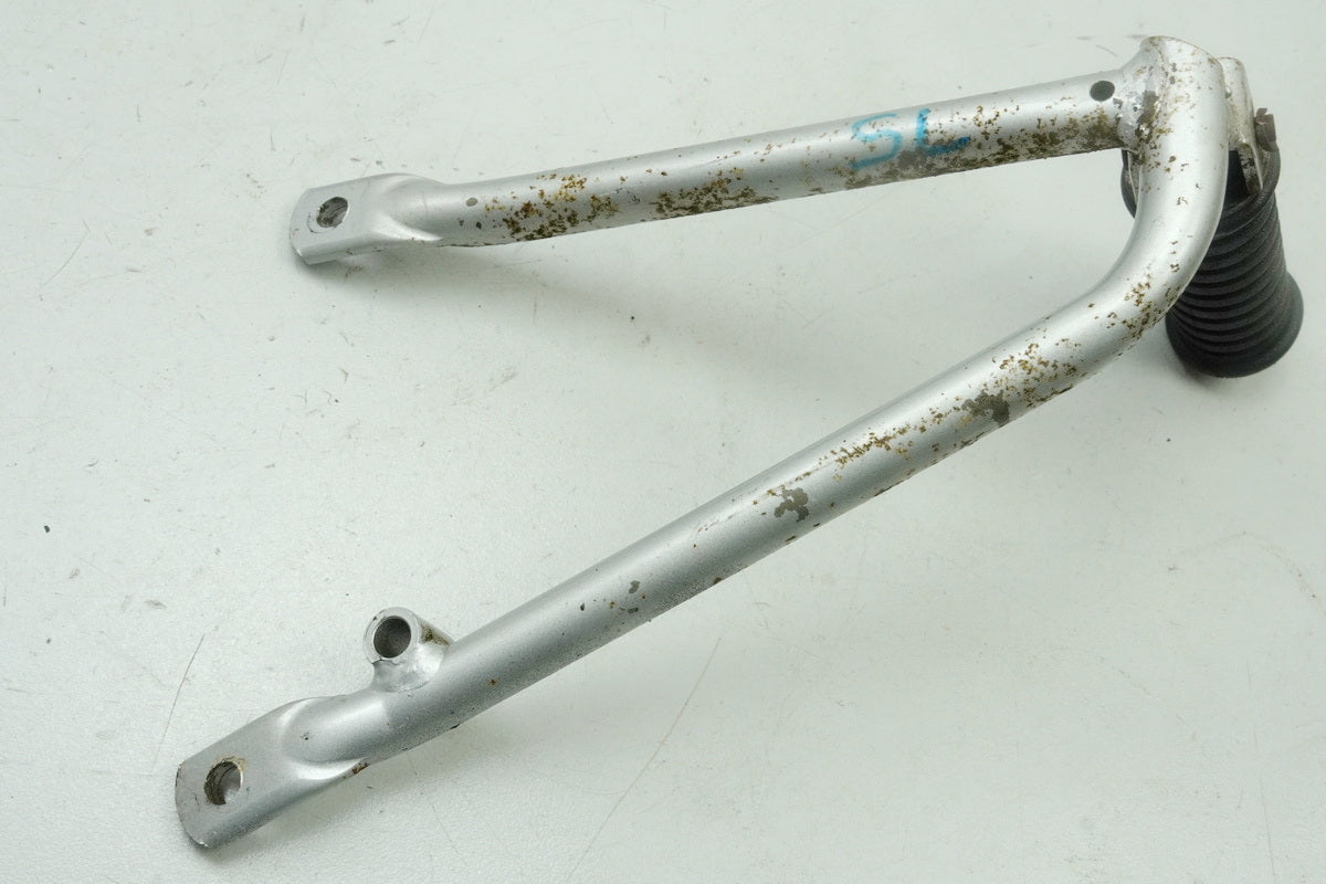 SUZUKI RG 125 NF12B GAMMA Footrest Pillion left Holder Footrest System