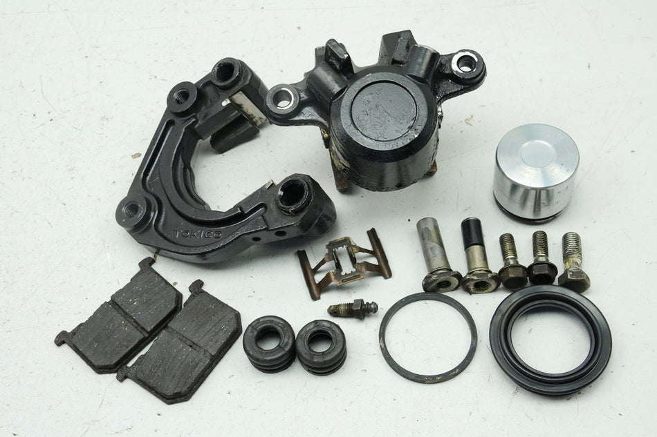 KAWASAKI Z 750 E KZ750E Bremssattel links Bremskolben Bremszange Ankerplatte