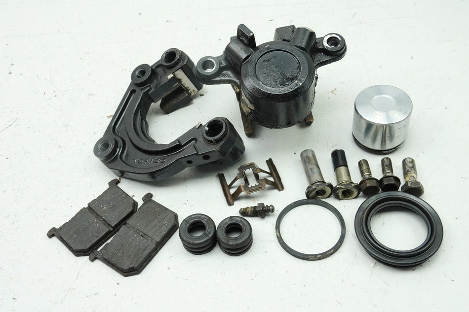 KAWASAKI Z 750 E KZ750E Bremssattel links Bremskolben Bremszange Ankerplatte