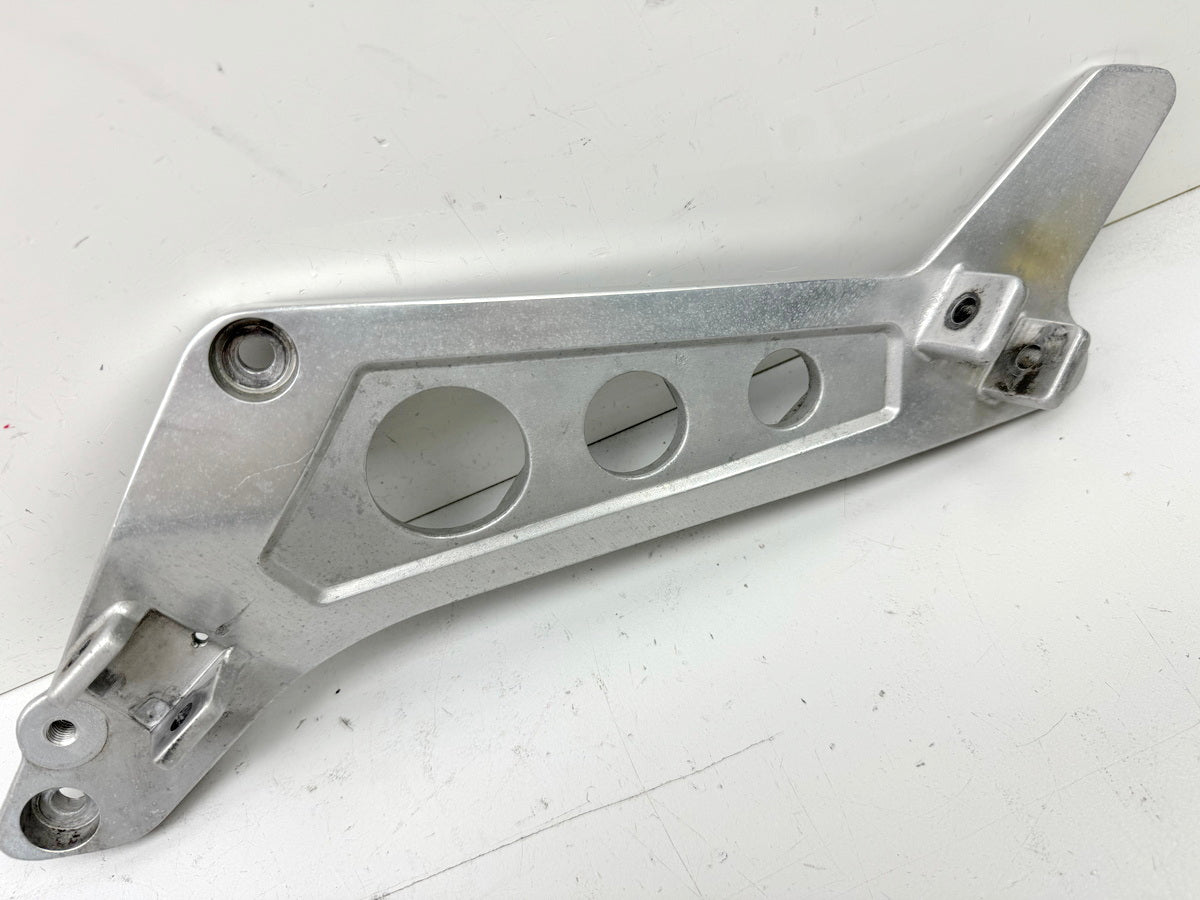 HONDA NTV 650 RC33 REVERE Reposapiés del conductor izquierdo Soporte Estribera