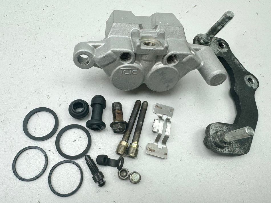 HYOSUNG GT 125 N Comet Bremssattel hinten original Bremszange Halter Ankerplatte