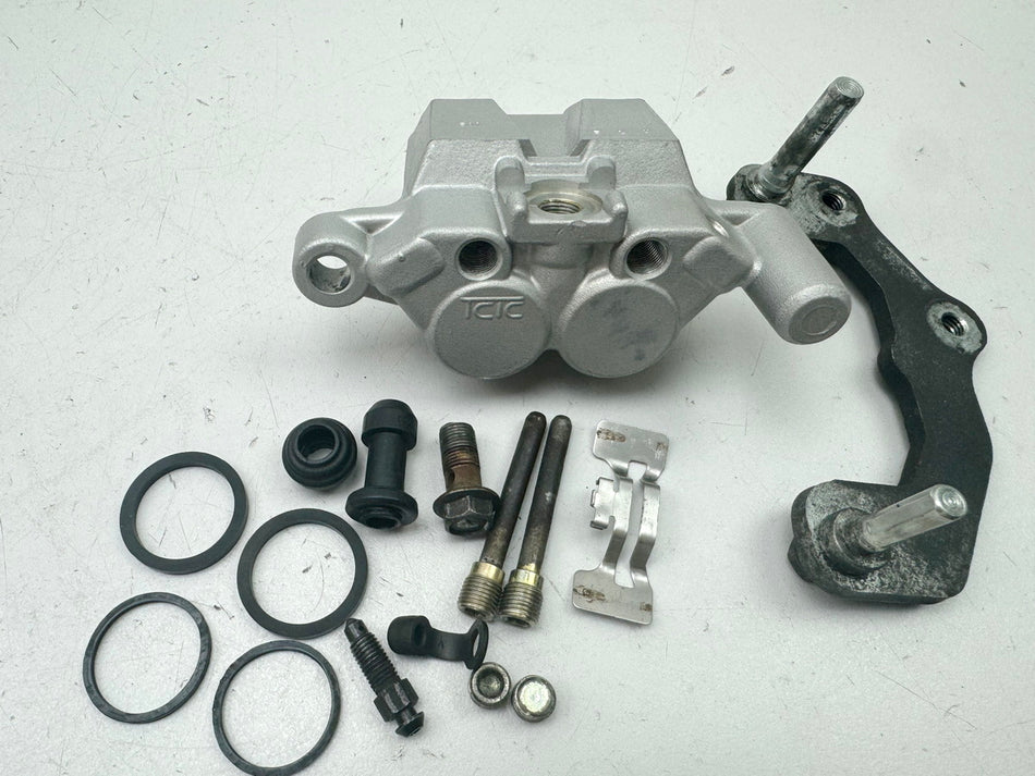 HYOSUNG GT 125 N Comet Bremssattel hinten original Bremszange Halter Ankerplatte