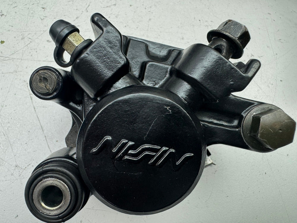HONDA NX 650 RD08 DOMINATOR Bremssattel hinten Nissin Bremszange Bremskolben