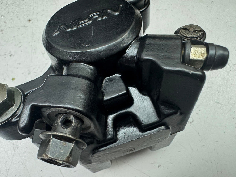 HONDA NX 650 RD08 DOMINATOR Bremssattel hinten Nissin Bremszange Bremskolben