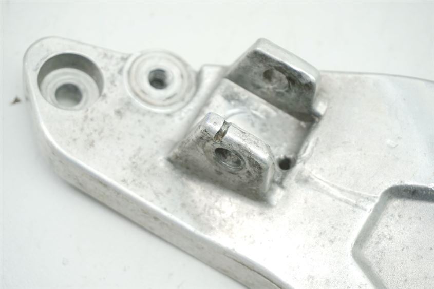 HONDA NTV 650 RC33 REVERE FOOTREST PLATE RIDER LEFT BRACKET FOOTREST