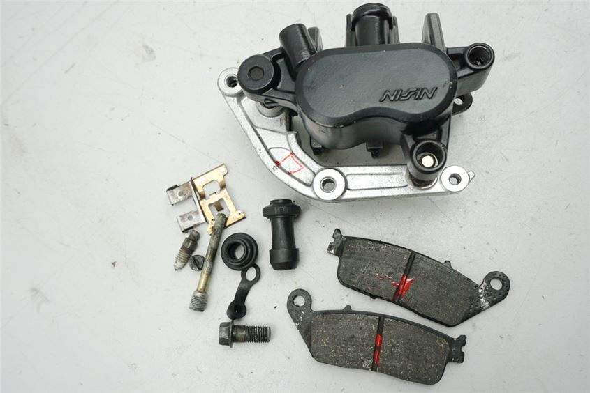 HONDA CBR 1000 SC24 BRAKE CALIPER LEFT ANCHOR PLATE